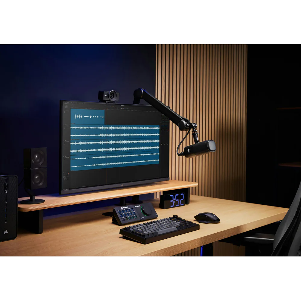 Elgato Wave Mic Arm MK.2 supporting a microphone above a desktop